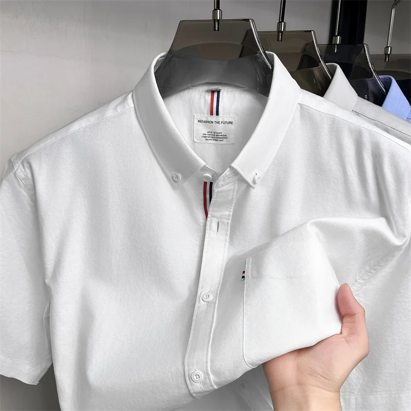 Hochwertiges Kurzarmhemd aus 100 % Baumwolle Sommer-Designermarke klassisches einfarbiges Revers-Oberteil modische Business-Casual-Herrenbekleidung