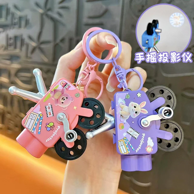 크리 에이 티브 작은 동물 핸드 크랭크 프로젝터 키 체인 귀여운 Schoolbag 장식 펜던트 재미 빛나는 프로젝터 장난감 작은 선물