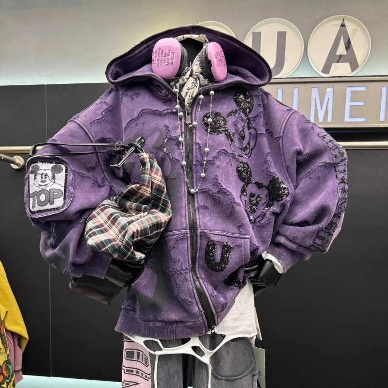 เสื้อแจ็คเก็ตมีฮู้ดลายการ์ตูนประดับลูกปัดสไตล์อินดัสเทรียลหนัก รุ่นใหม่ประจำฤดูหนาวปี 2025 สำหรับผู้หญิง ทรงหลวม แฟชั่น ผ้าฟลีซ แขนยาว ซิป