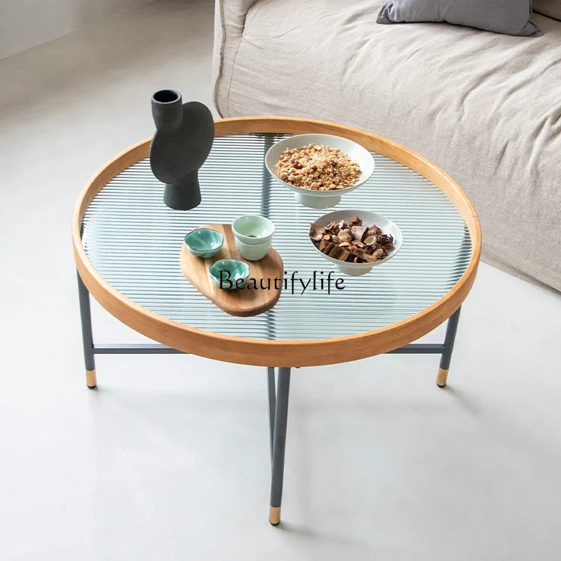 

Japanese-style solid wood extremely simple round Changhong glass coffee table Nordic small apartment living room household table