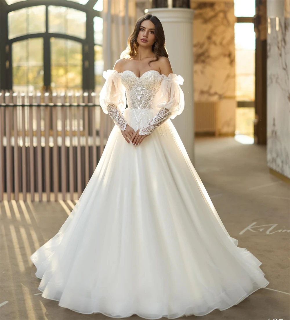 

Customized Sexy Ivory Organza Wedding Dress Boho Sweetheart Long Sleeves Robe de mariée Dreamy A-Line Court Train Robe de mariée