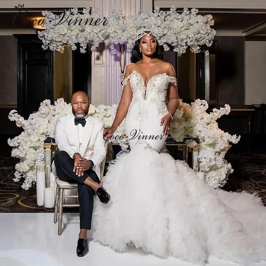 

Customized Off The Shoulder V Neck Africa Wedding Dress Mermaid 2026 Beaded Lace Embroidery Tulle Ruffles Wedding Dresses W1508