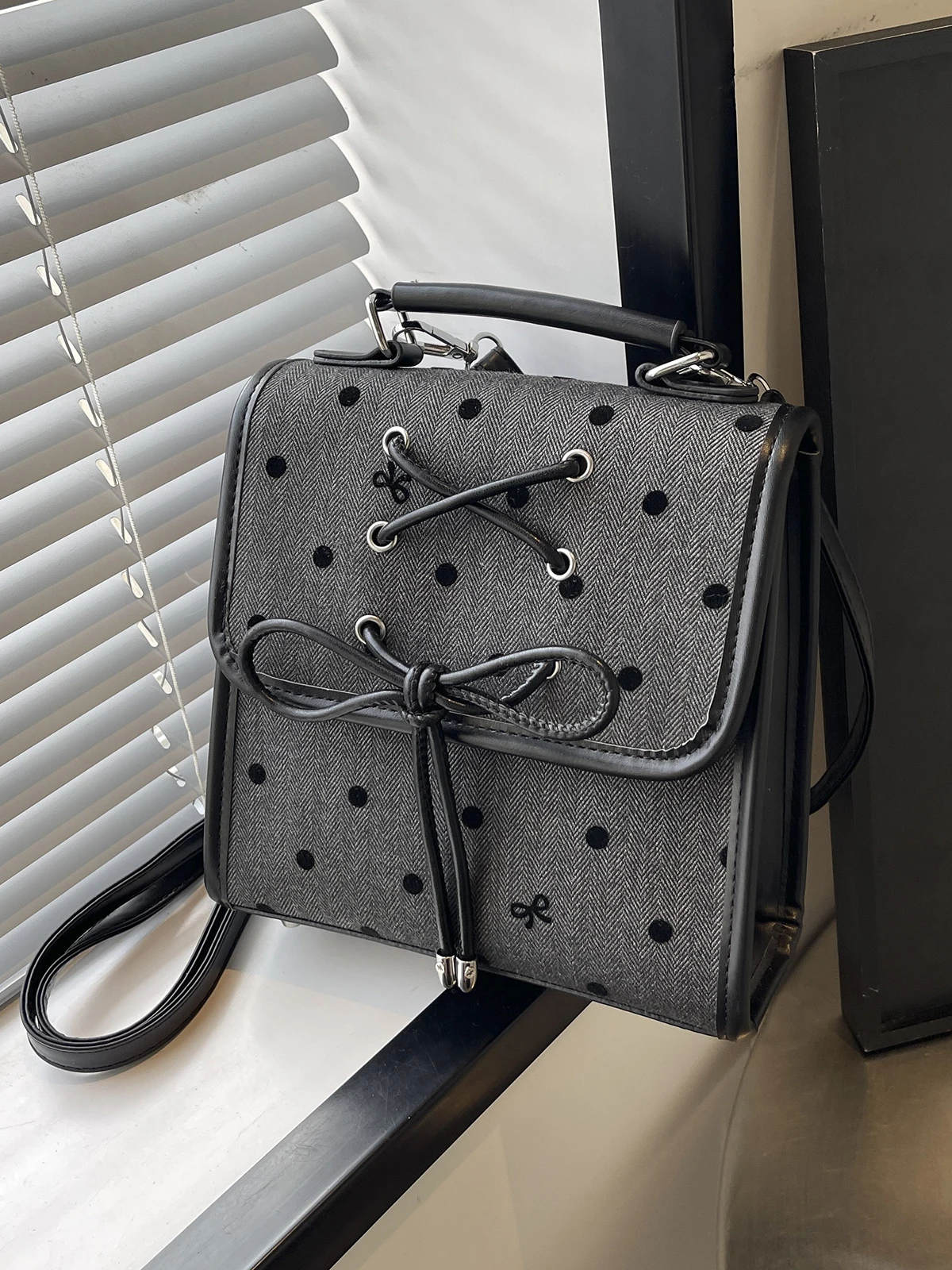 

Exquisite mini women's backpack 2024 new travel backpacks popular polka-dot crossbody bag.