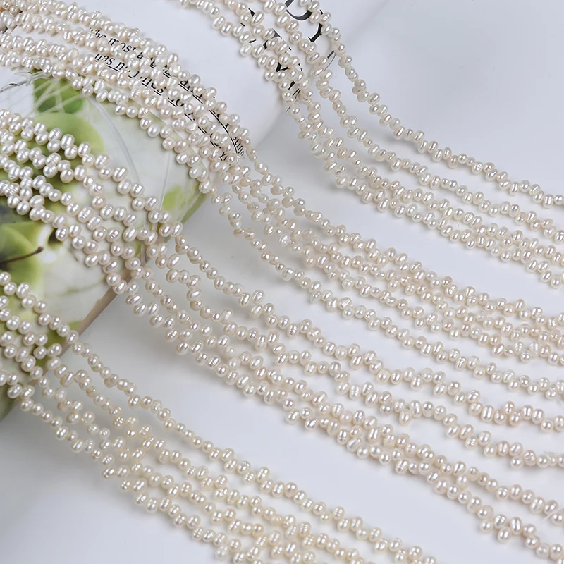 

Hot Sale Top Hole White Color Rice Freshwater Pearl Strand