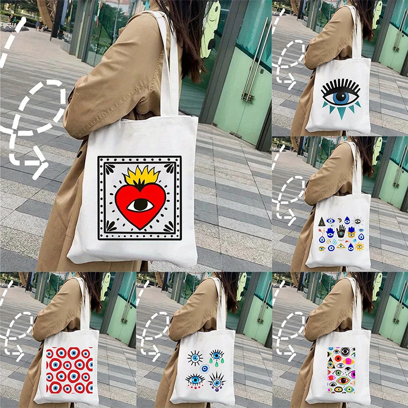 Bolso de mano de lona con estampado de ojos malvados coloridos, bolso de hombro plegable ligero, ropa de calle Harajuku, bolso Beige informal para uso diario