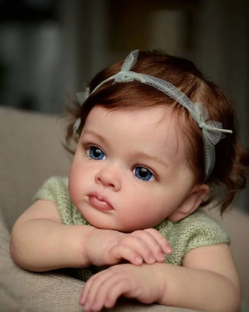 

Bebê Reborn Dolls 21 Inch Tutti Painted Lifelike Baby Doll With Brown Curly Hair Reborn Doll Muñecas Reborn