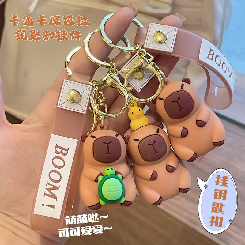 

New Cute Capybara Handheld Keychain Ugly Cute Creative Anime Dolphin Model Key Pendant Backpack Car Pendant Birthday Gift