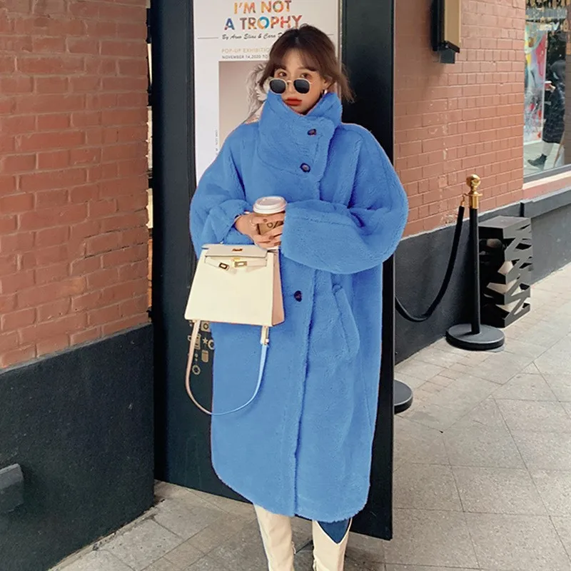 The new casual plush coat for women a mixed fur with long stand-up collar exudes stylish and elegant vibe