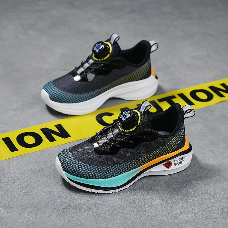 

Sports shoes Boys 2025 new primary school soft sole shock absorption rotating button mesh non-slip running shoes for children