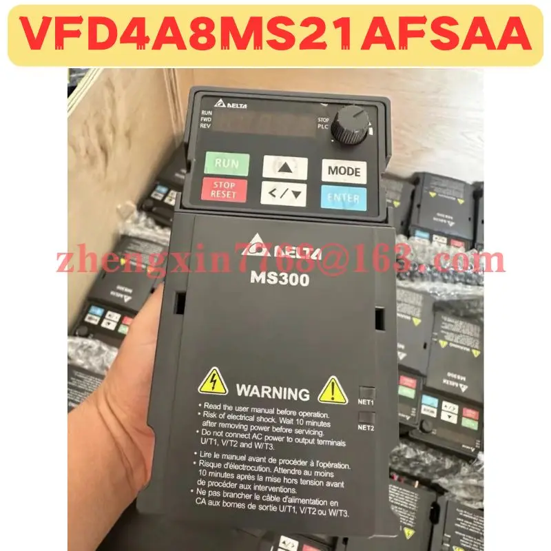 

Used Frequency Converter VFD4A8MS21AFSAA Normal Function Tested OK