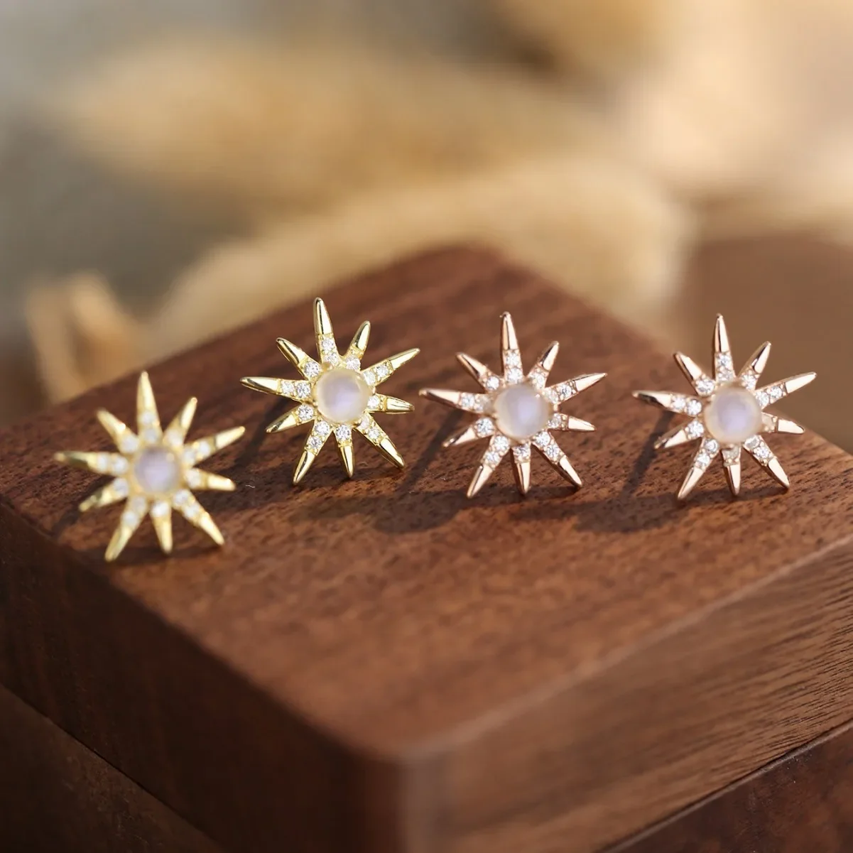 

Popular European and American S925 Silver Moonlight Stone Design Sense Sunflower Earrings Small and Versatile