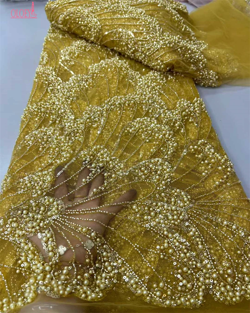 

African High-Quality French Heavy Beaded Tulle Lace Fabric with Sequins And Pearls for Bridal Party Dresses 2025 Style Nigeria