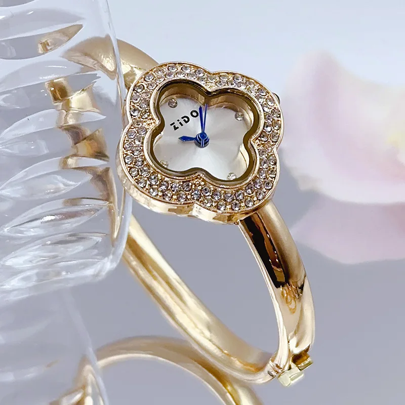 ساعة تناظرية كوارتز كلاسيكية بيضاوية أنيقة للنساء، صندوق حزام ساعة عصري متضمن، هدية مثالية، إكسسوار مجوهرات أنيق