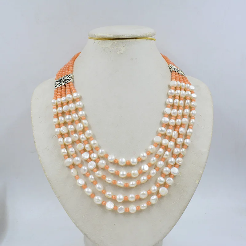 

The most classic. 5 rows of 4mm semi precious gemstones and 8mm natural white freshwater pearls. DIY Handwoven Women's Necklace