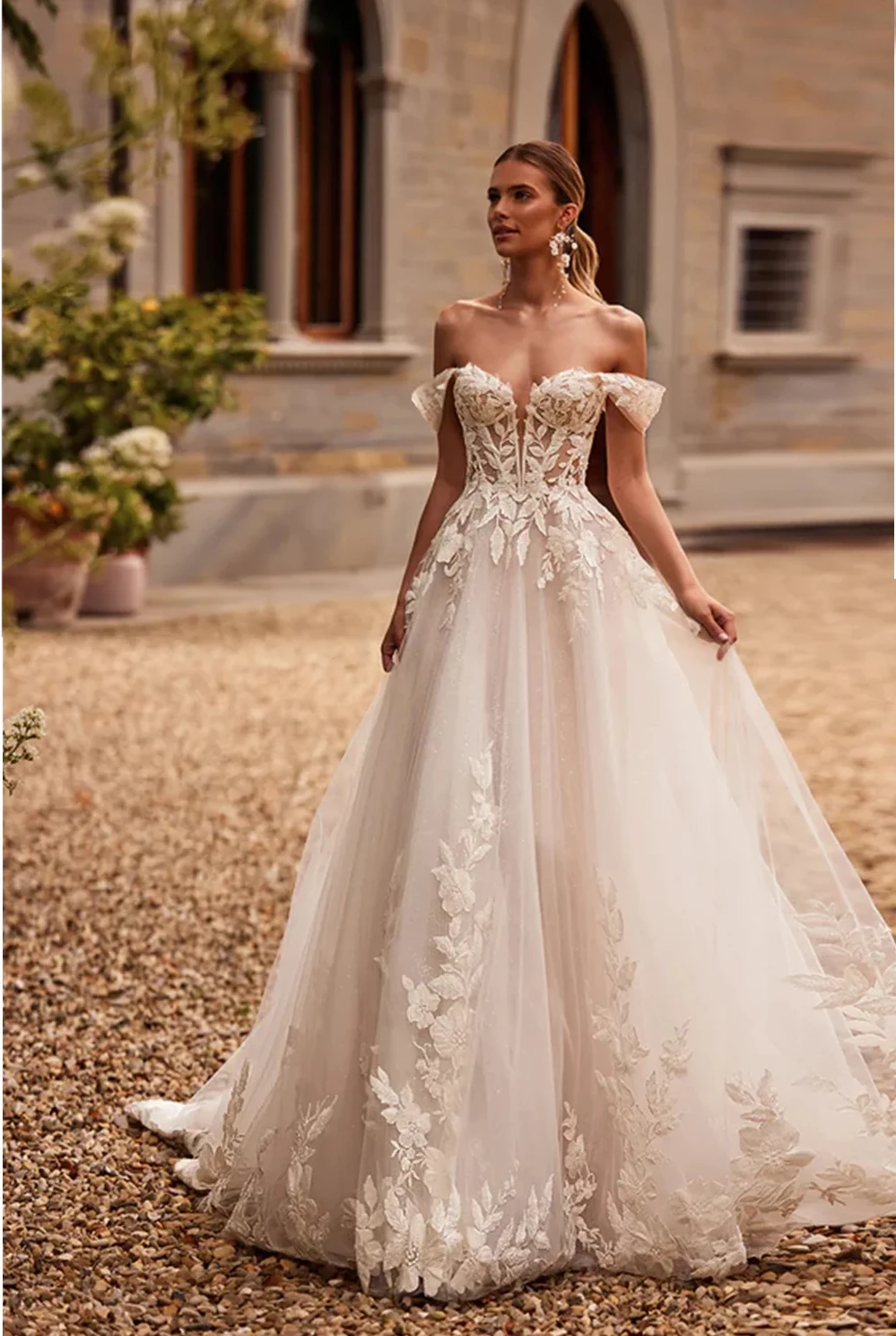 Encantador fuera del hombro apliques de encaje de flores 3D una línea vestidos de novia hechos a medida 2025 Rode De Morrie