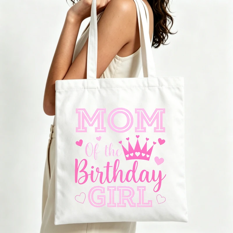 Mom's canvas tote bag with crown and heart print, perfect for birthday celebrations and casual outings