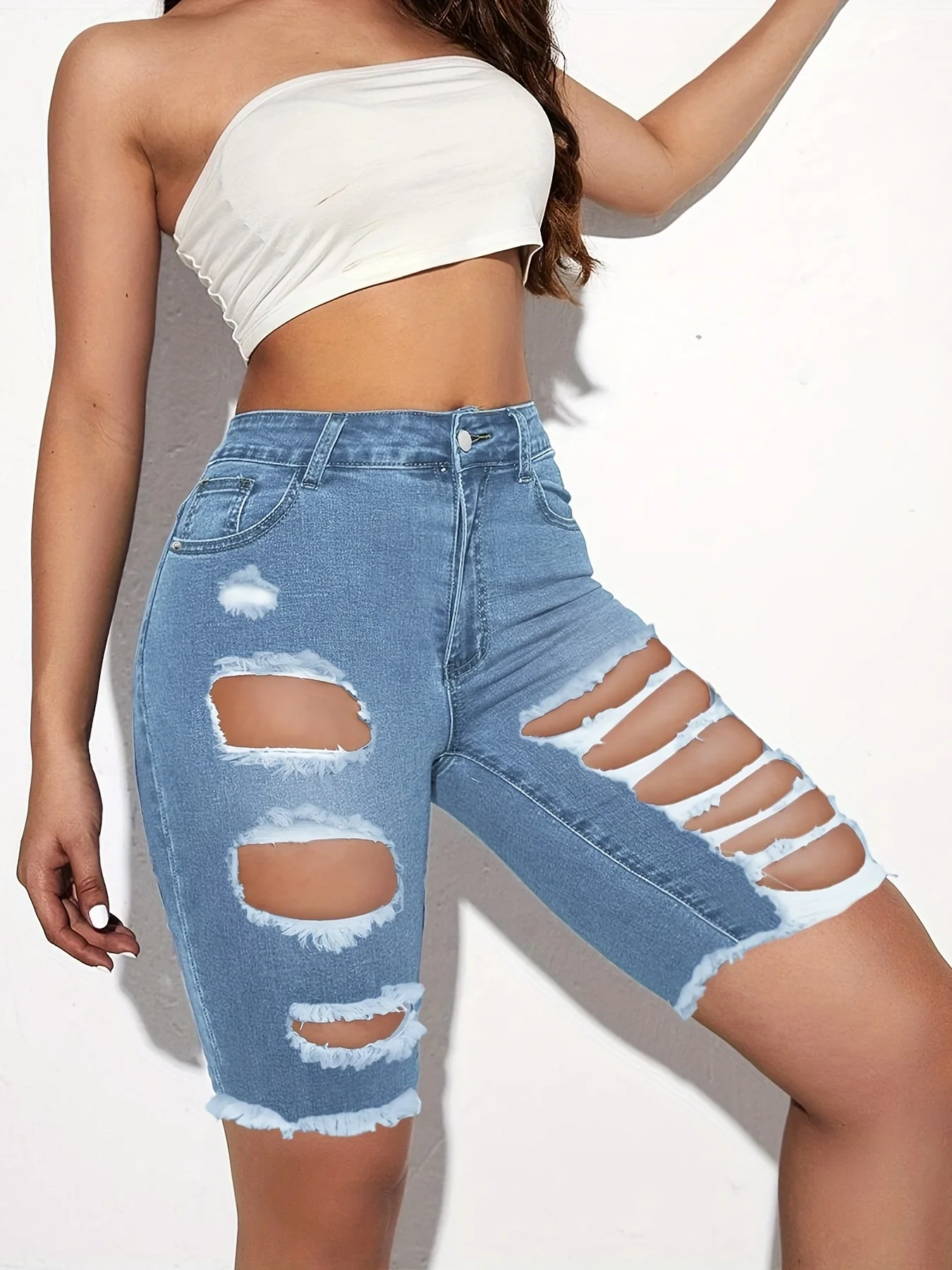 Women\'s fashion jeans with holes in them