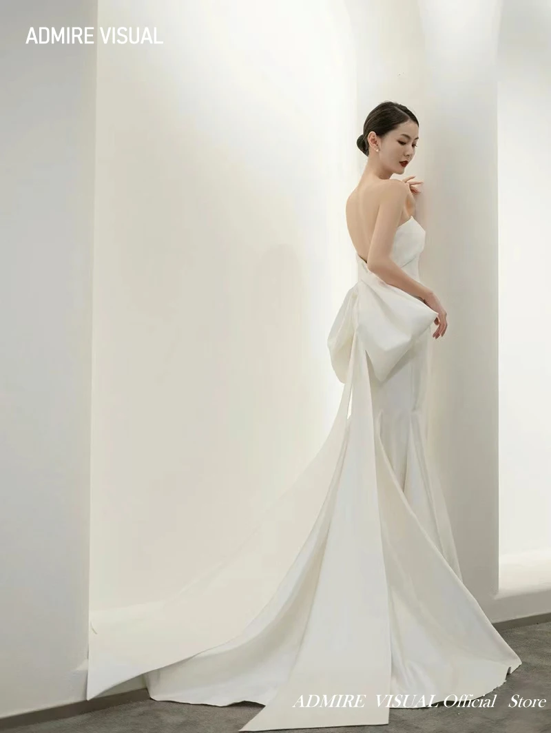 Il più nuovo abito da sposa sirena per la sposa elegante raso senza spalline senza maniche con fiocco su misura taglie forti Vestidos De Novias