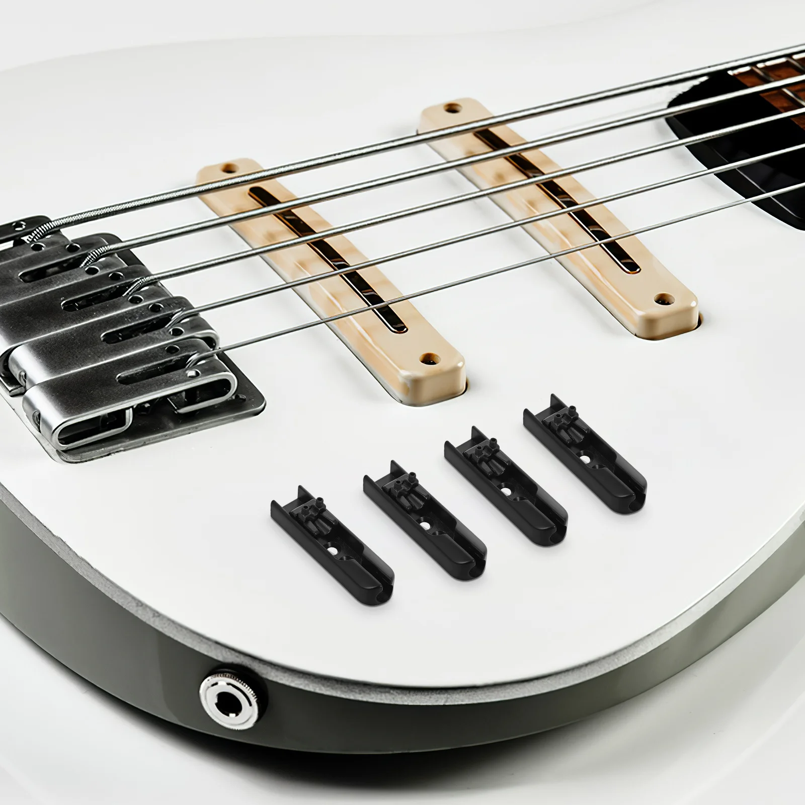 

4Pcs Bass Single Bridge for 4-String Electric Bass Black Durable Replacement Bridge Saddles for Guitar Parts Enhanced