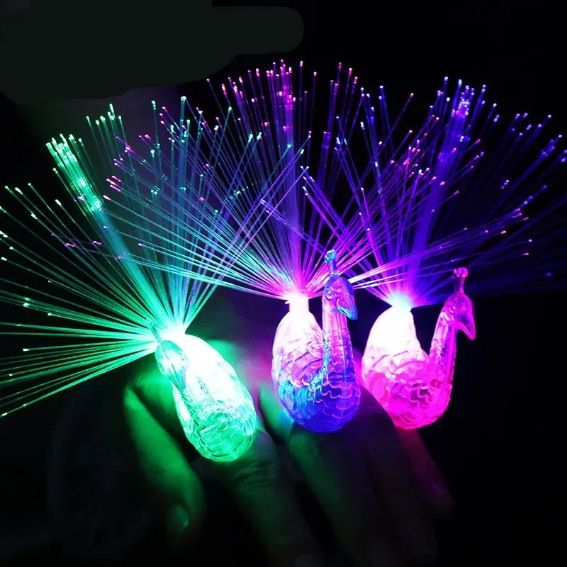 

50pcs/lot Flashing LED Light Up Toys Peacock finger light rings Glowing color changing peacock ring LED accessories night toys