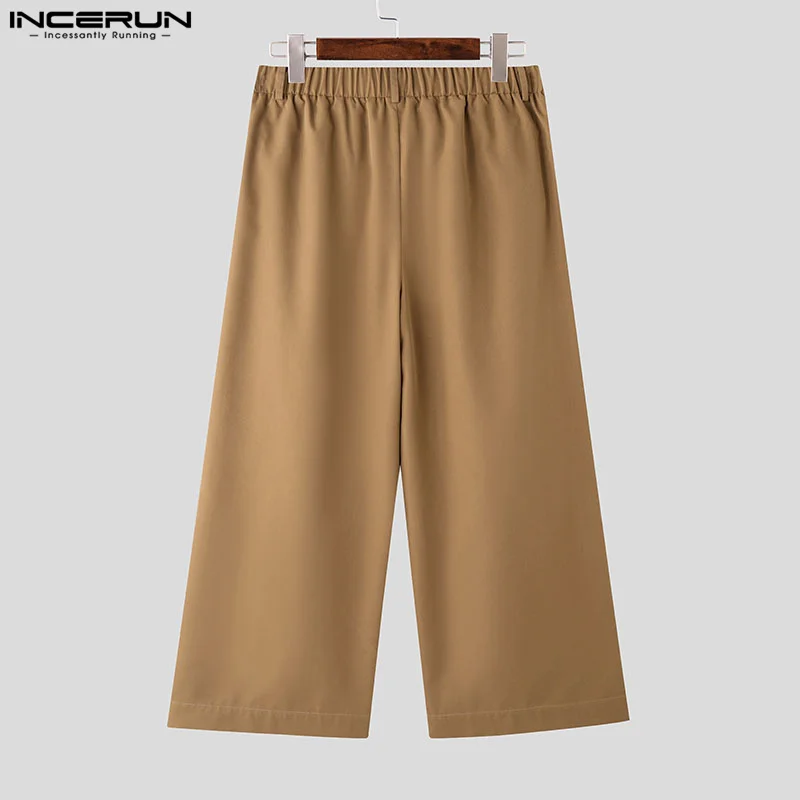 INCERUN الرجال بنطال ذو قصة أرجل واسعة بلون مطوي مرونة الخصر ركض بنطلون الرجال كبيرة الحجم الشارع الشهير موضة السراويل الذكور غير رسمية