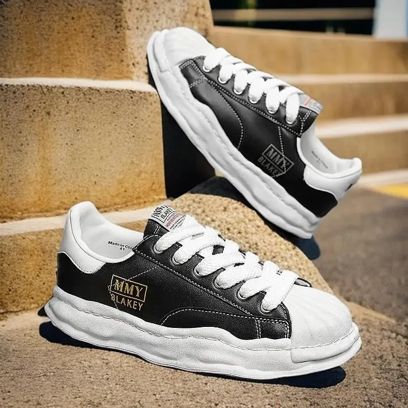 Eenvoudige en sfeervolle leren canvasschoenen en veelzijdige, ademende, comfortabele casual sportschoenen