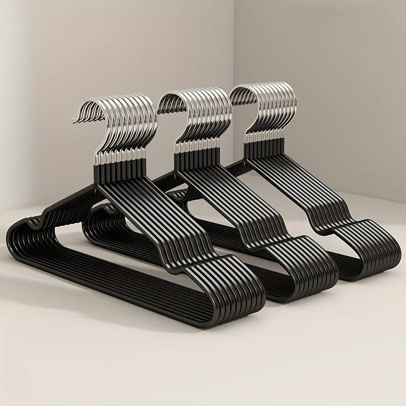10-piece anti-slip and durable metal hangers with rubber coating. These space-saving clothes hooks have shoulder grooves.