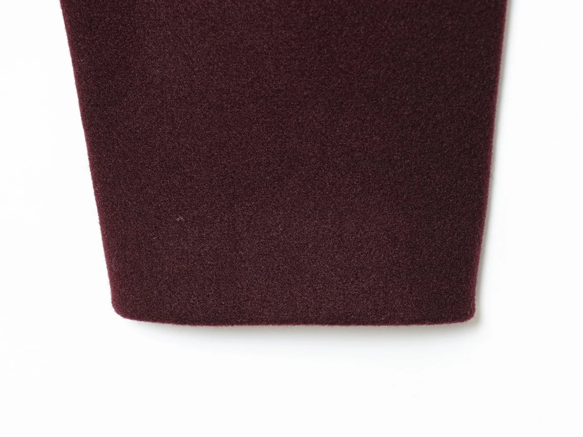 เสื้อแจ็คเก็ตผู้หญิงสีพื้น คอทรงโอ แขนสั้น แบบใหม่สำหรับฤดูใบไม้ร่วงและฤดูหนาว พร้อมกระดุมสีทอง เนื้อผ้าขนสัตว์ ชายเสื้อยืดหยุ่น ดีไซน์เก๋ไก๋