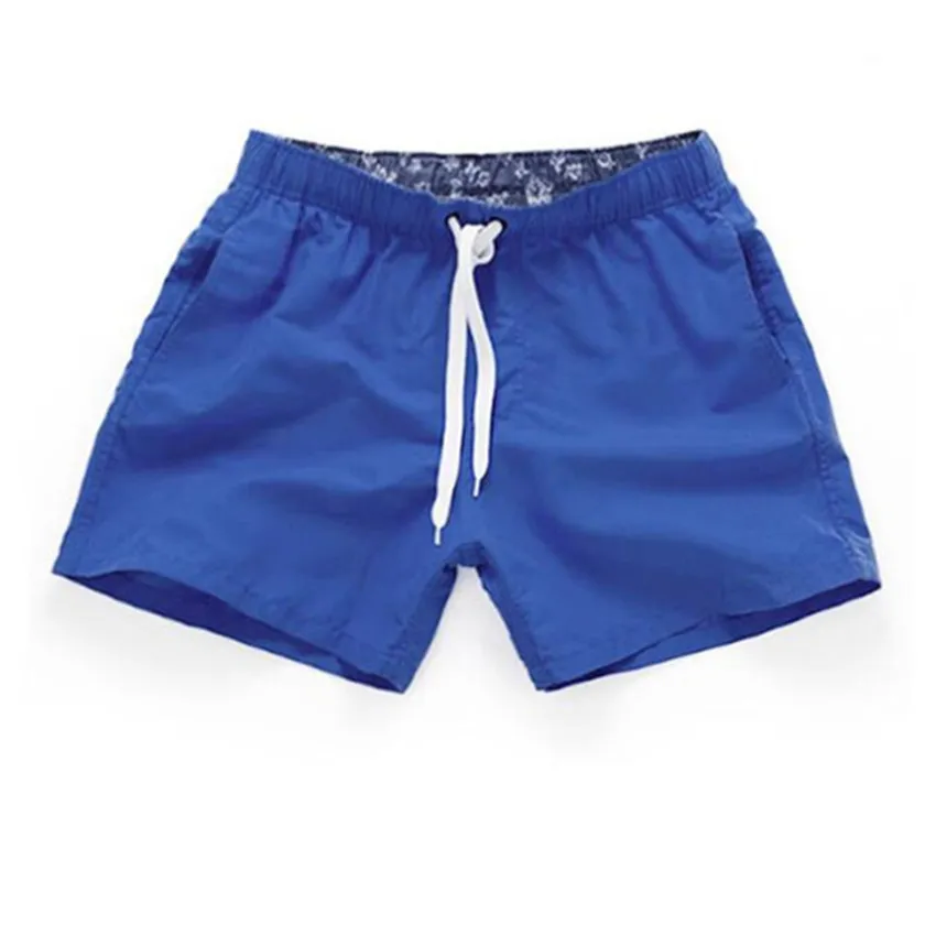 Solid color sports shorts for men\'s summer 2024 hot selling beach pants for loose and casual sports