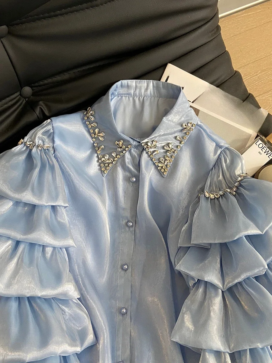 2025 Primavera Nuova camicia alla moda chic Bellissimo diamante Comfort allentato Camicie con bordo foglia di loto Manica lunga femminile Top monopetto