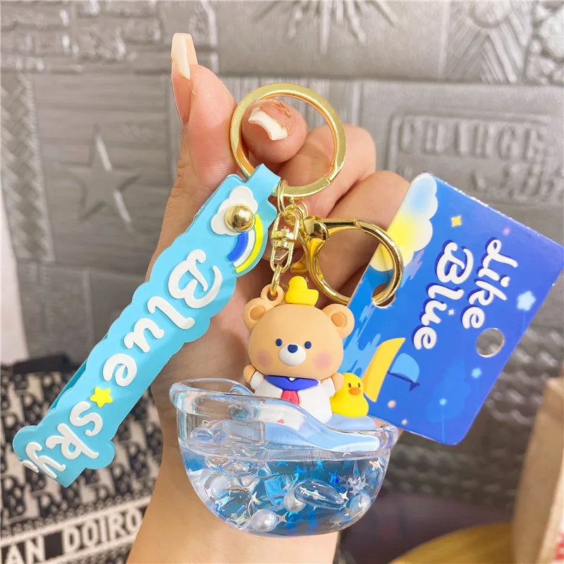 Creative Sailing Suit Dog Duck Oil Sailing Boat Quicksand Keychain Doll Cute Floating Pearl Ice Starfish Liquid Key Chain Bag