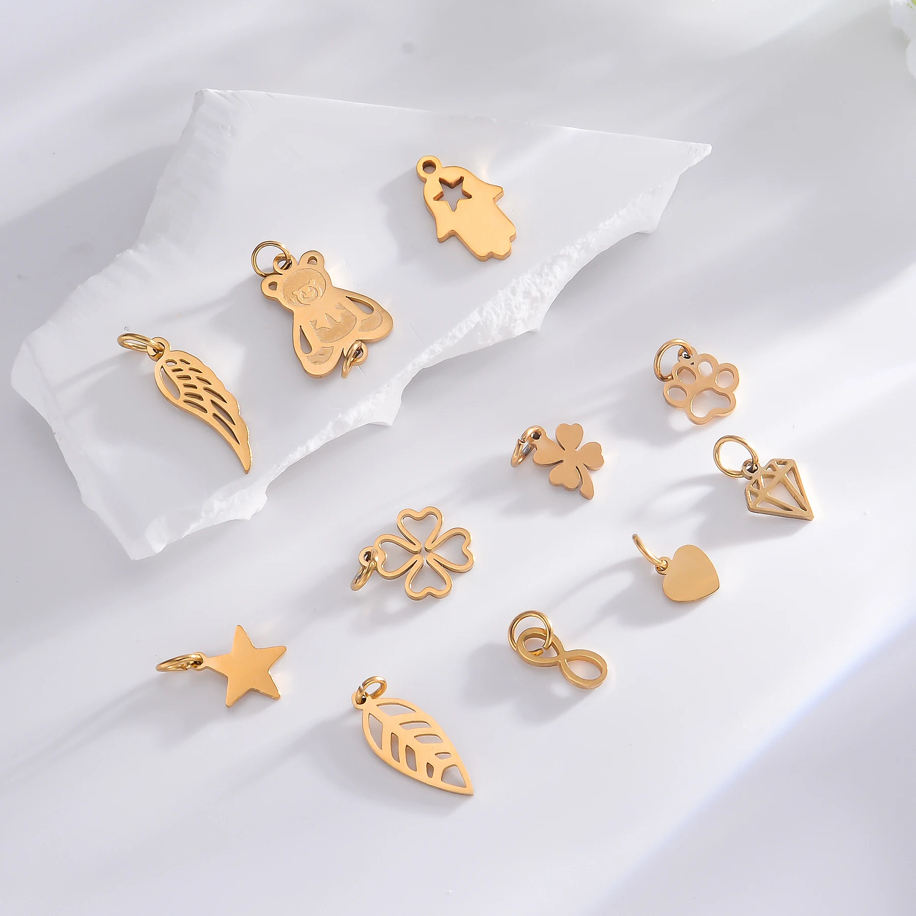 6 Stück/Set Edelstahl Spiegelpolierte Mini-Anhänger in Form von Herz, Stern, Flügel, Pfote, Hand und Blume für DIY-Schmuckherstellung Zubehör – Detail 3