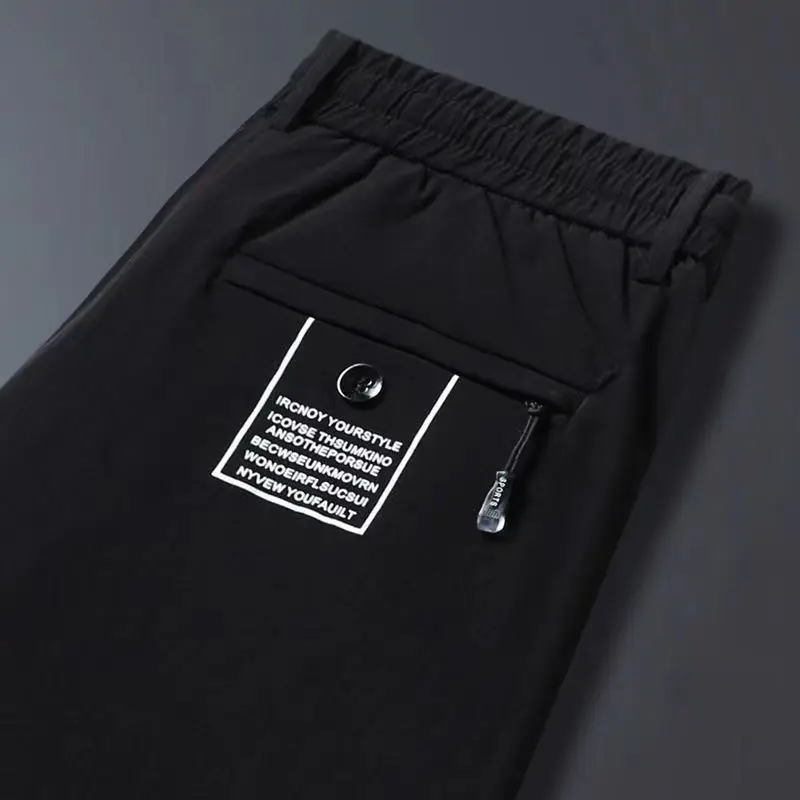 Fashion Printed Letter Pockets Straight Casual Pants Men\'s Clothing 2024 Summer New Loose Elastic Lace Up High Waist Trousers