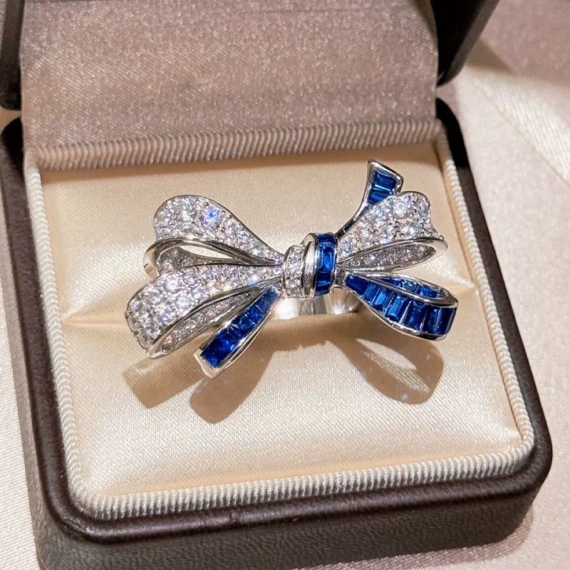 

Cameo Elegant Bow Knot Ring for Women 925 Silver White Gold Plated Blue Sapphire Micro Paved CZ Luxury Romantic Cocktail Rings