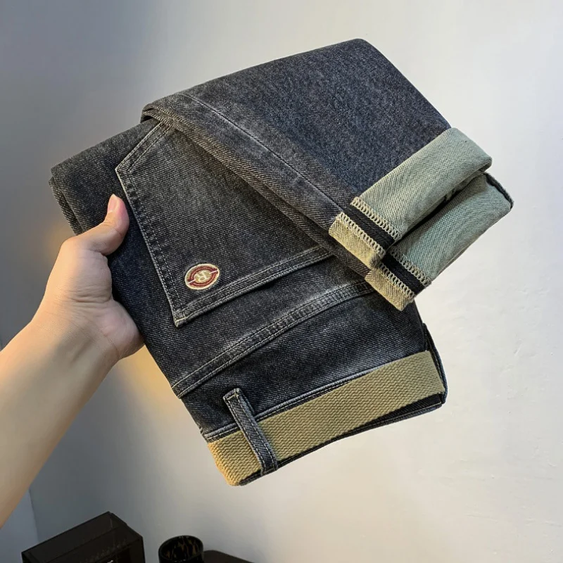 High-End Jeans Voor Heren 2024 Herfst Nieuwe Elastische Casual Kokerbroek Denim Zwart Grijze Riemstijl Skinny Broek