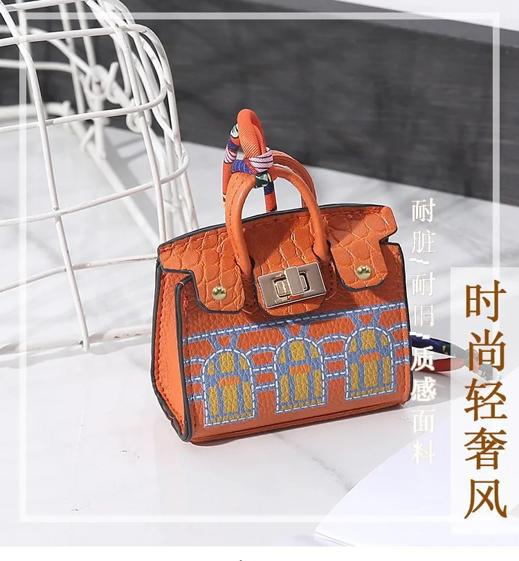 1 Stück modische Joker Mini Tide Druckmünzbörse, tragbare Kopfhörer- und Kleingeld-Aufbewahrungstasche, Anhänger, multifunktionale Tasche – Detail 3