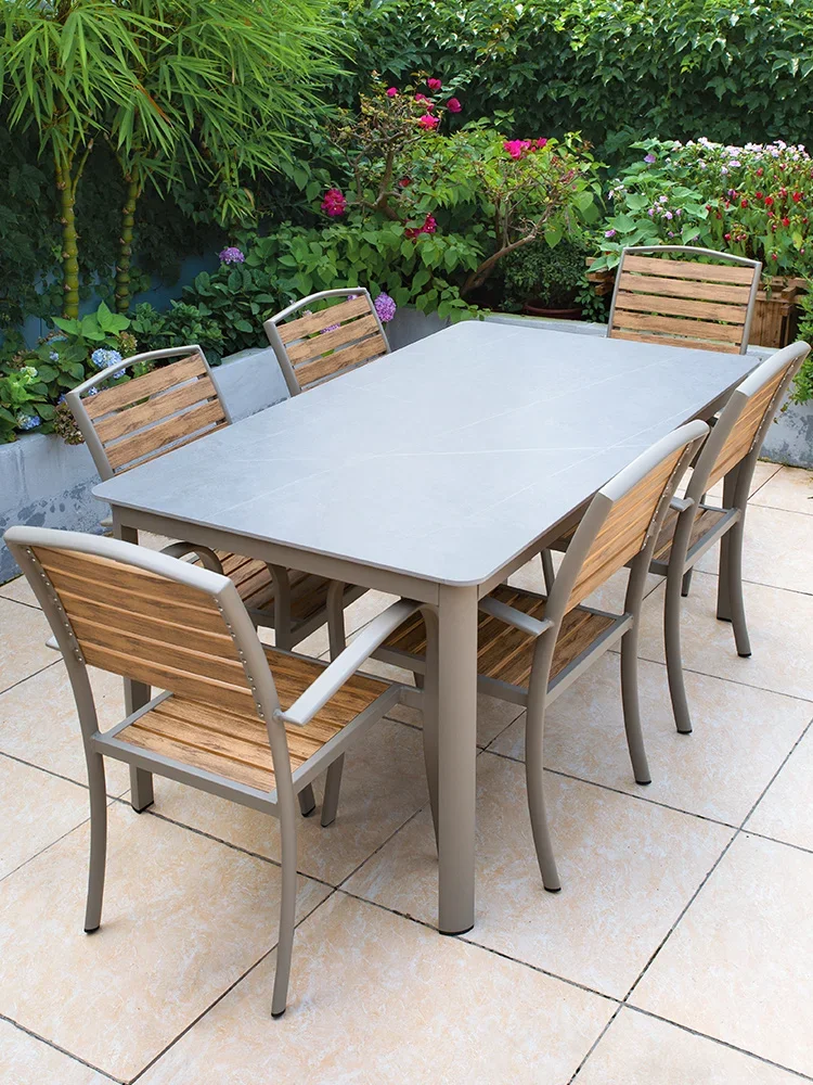 Outdoor dining tables and chairs combination of high-end luxury marble tables and chairs modern outdoor waterproof and sunscreen