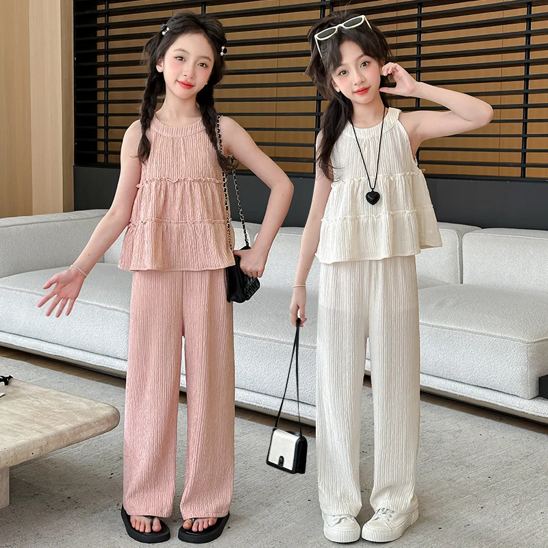 

Лето 2025 г., топ без рукавов в корейском стиле с круглым вырезом и высокой талией, свободный крой, повседневные прямые брюки, комплект из 2 предметов для девочек