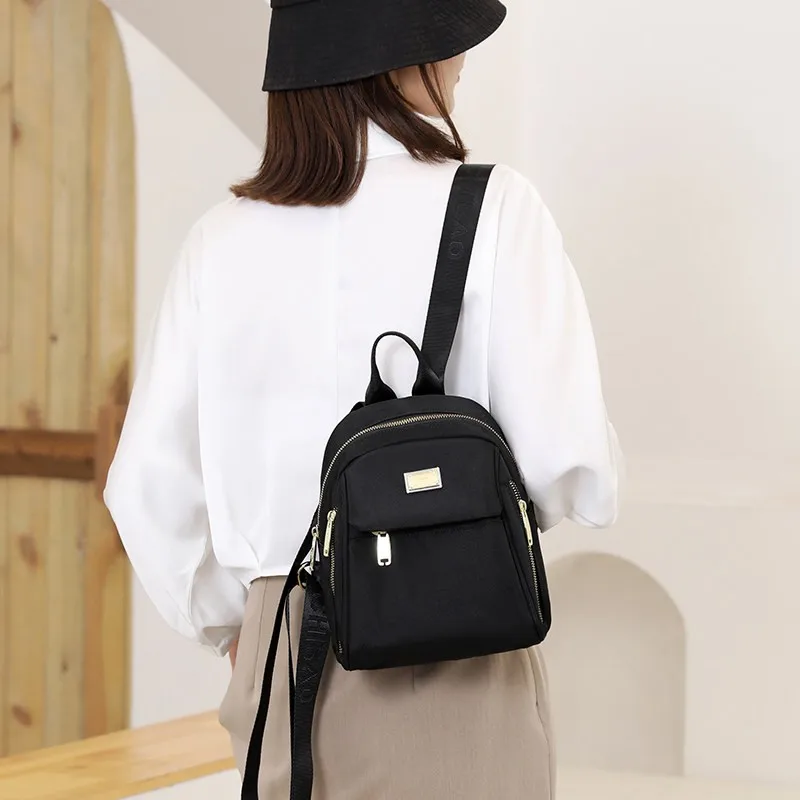 

Oxford Cloth Backpack Lightweight Casual Double Shoulder Mountain Climbing Travel Waterproof New 2026 Fashion Ladies Bag