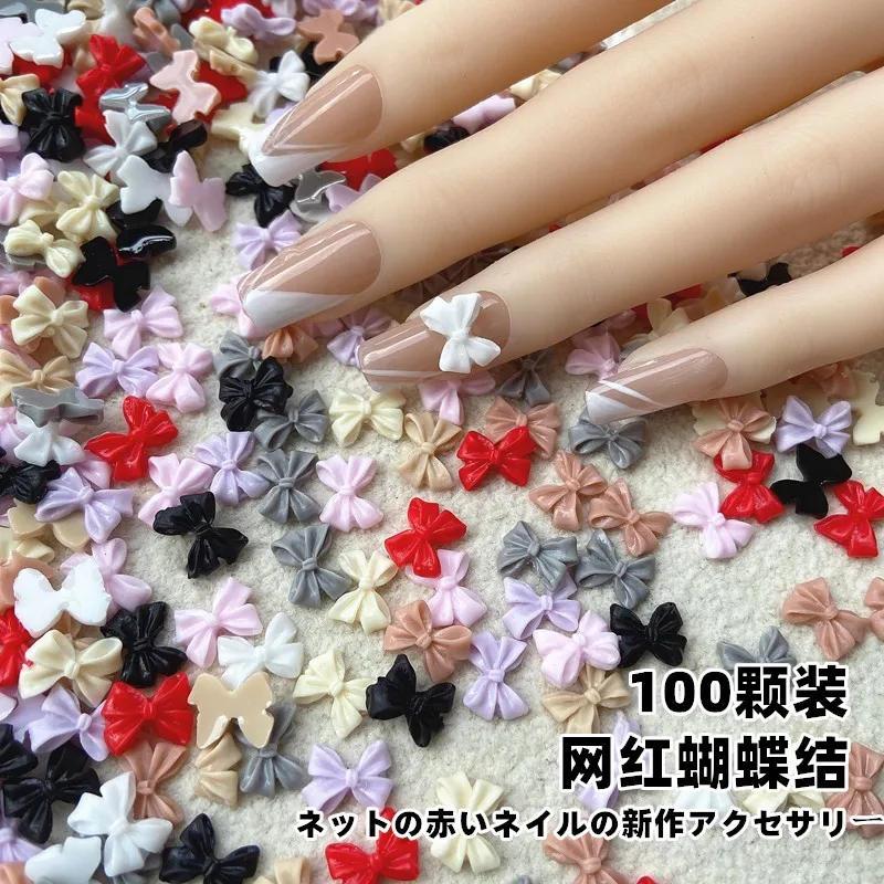 귀여운 나비 매듭 네일 참 쥬얼리, 귀여운 요정 수지 리본 보우 네일 아트 장식, 11x8mm 플랫 백 나비 넥타이, # J, 50 개, 100 개