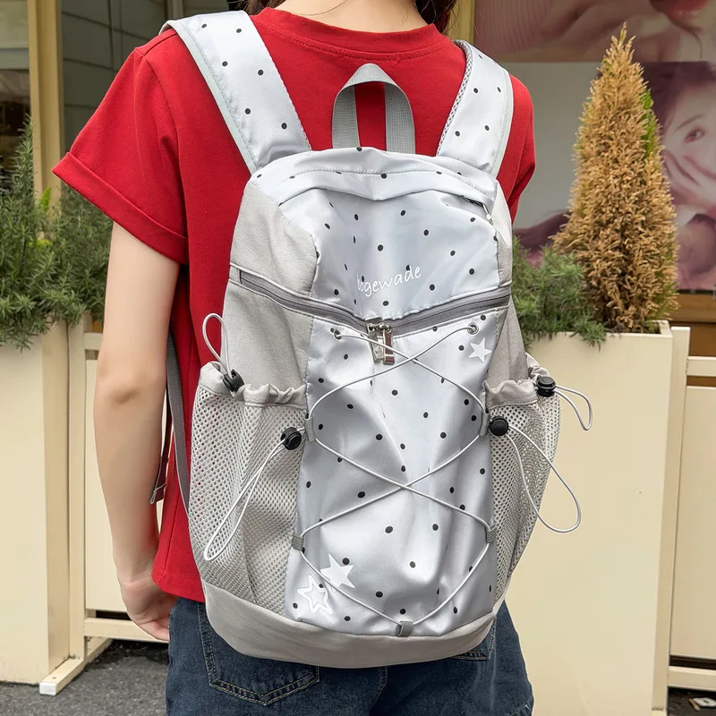 Korean-style polka dot mini backpack for female college students, commuter backpack with high aesthetic value, unique design, li