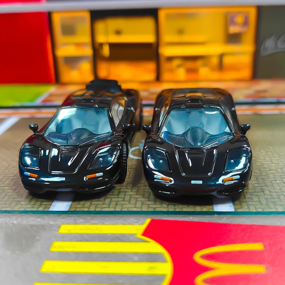 รถโมเดลไดแคสต์ Xcartoys x POP RACE 1:64 F1 สีดำเจ็ท จำนวน 2 คัน (ไม่มีกล่อง)