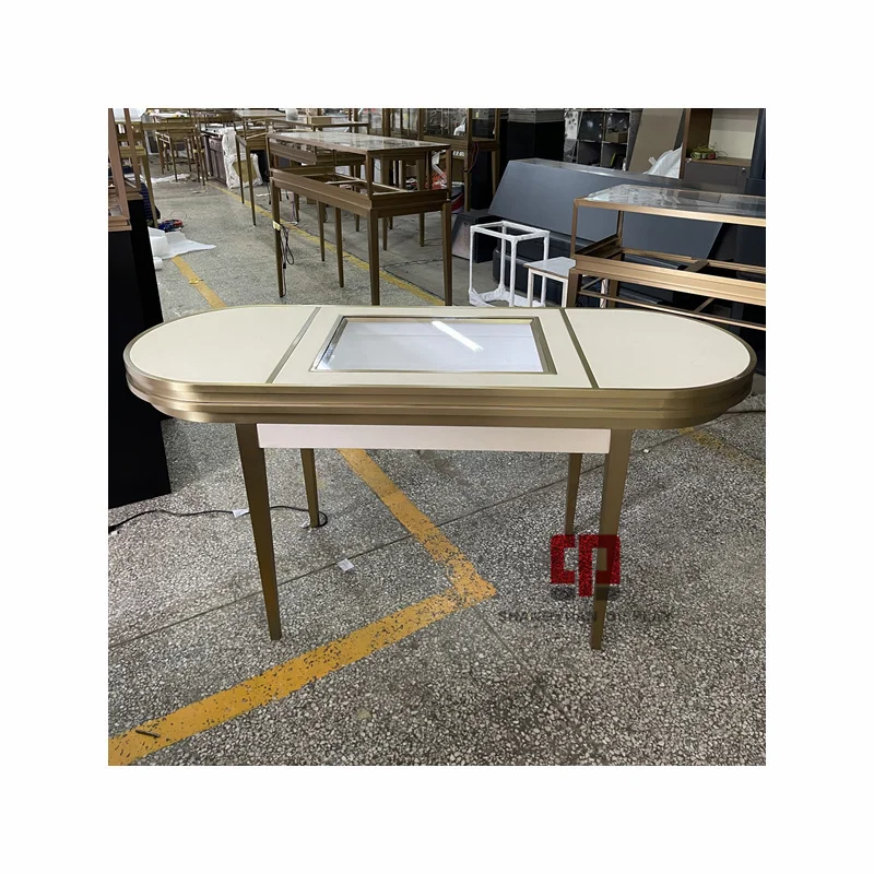 

custom.Luxury Jewelry Shop Furniture Table Oval Metal Stainless Steel Jewelry Display Table Showcase