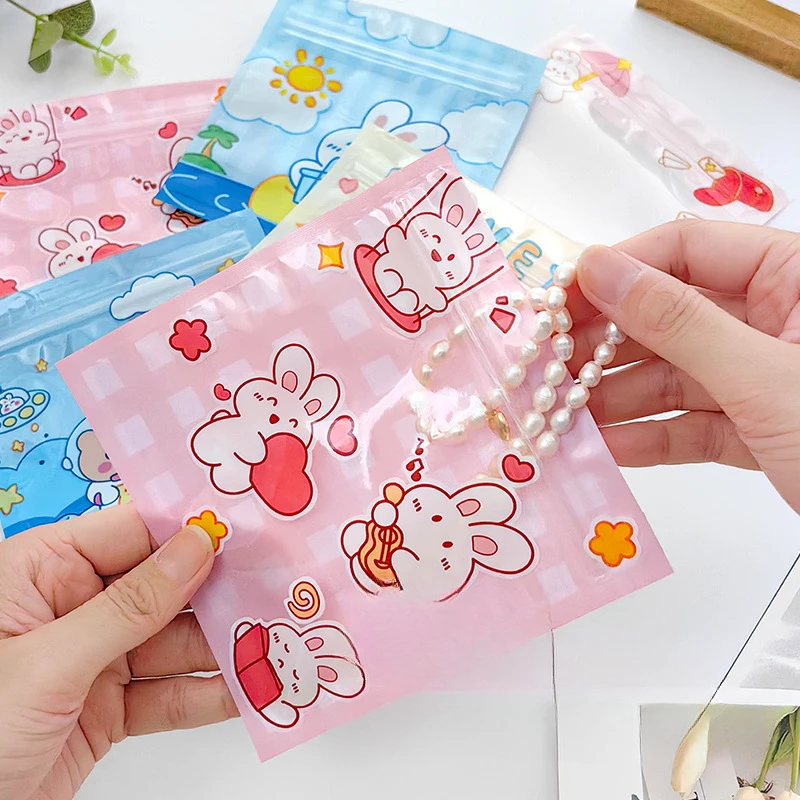 100 الكرتون لطيف رائعتين اكسسوارات مشبك شعر التعبئة والتغليف حقيبة تخزين المجوهرات كابل بيانات حقيبة عزل العناصر الصغيرة الذاتي حقيبة عزل