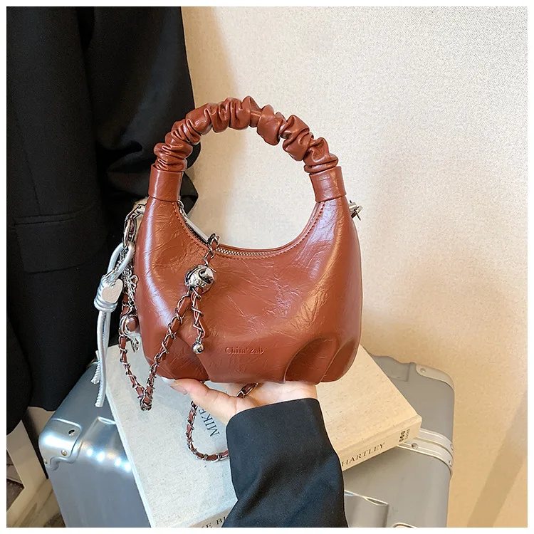 Solid color simple shoulder bag personalized pleated versatile cloud bag fashion PU leather temperament messenger bag women