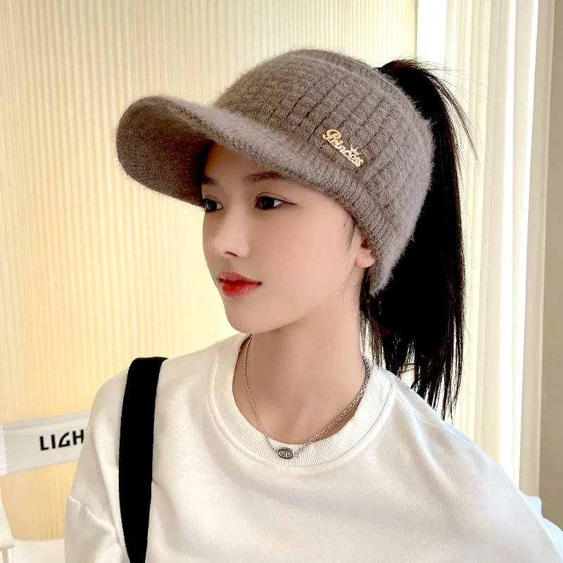 Autumn and winter women\'s ponytail cap sports leisure knitted wool cap solid color warm students duck tongue cap plush cap