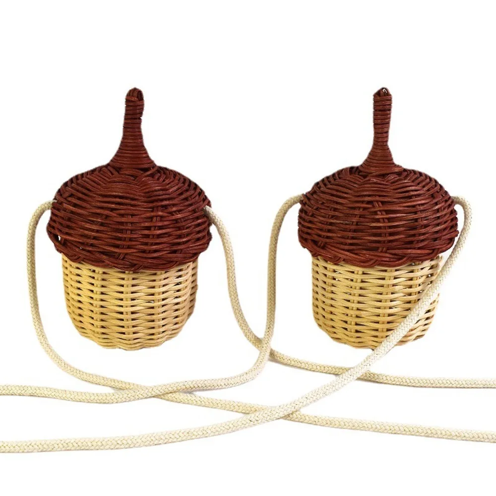 صور الدعائم المنسوجة كوز الصنوبر حقيبة يد كروس خمر كوز الصنوبر الصغير الروطان حقيبة يد للأطفال الصغار