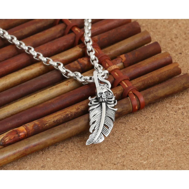 Wholesale S925 sterling silver ornament fashion retro Korean type skull small feather all-match pendant pendant