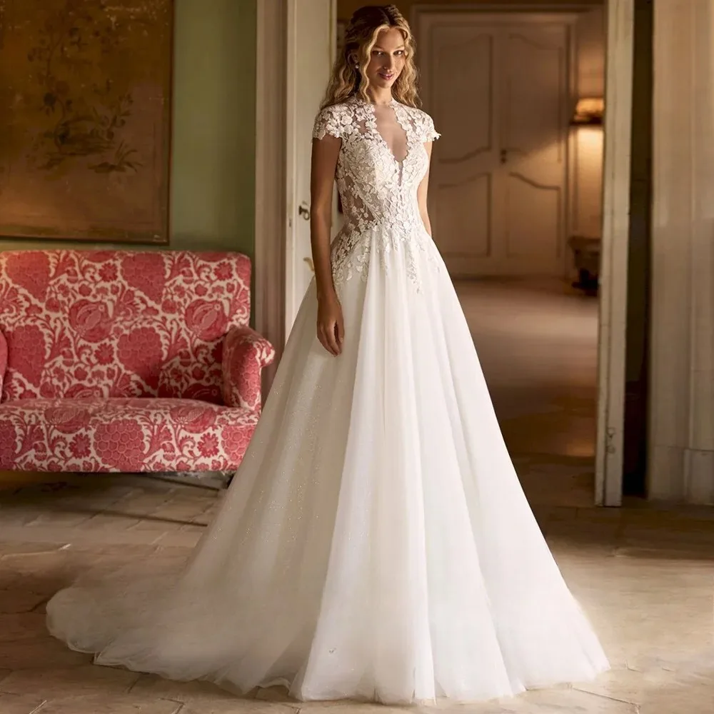 

Boho Short Sleeves A-line Wedding Dresses O Neck See Through Open Back Floor Length Bridal Gown Sweep Train vestido de novia