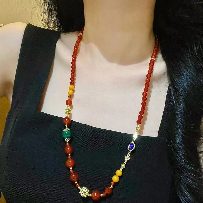 High-quality translucent pigeon-blood red natural carnelian and malachite necklace with a peacock design